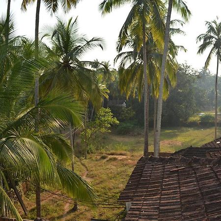 Vailankanni Guesthouse Morjim Bagian luar foto